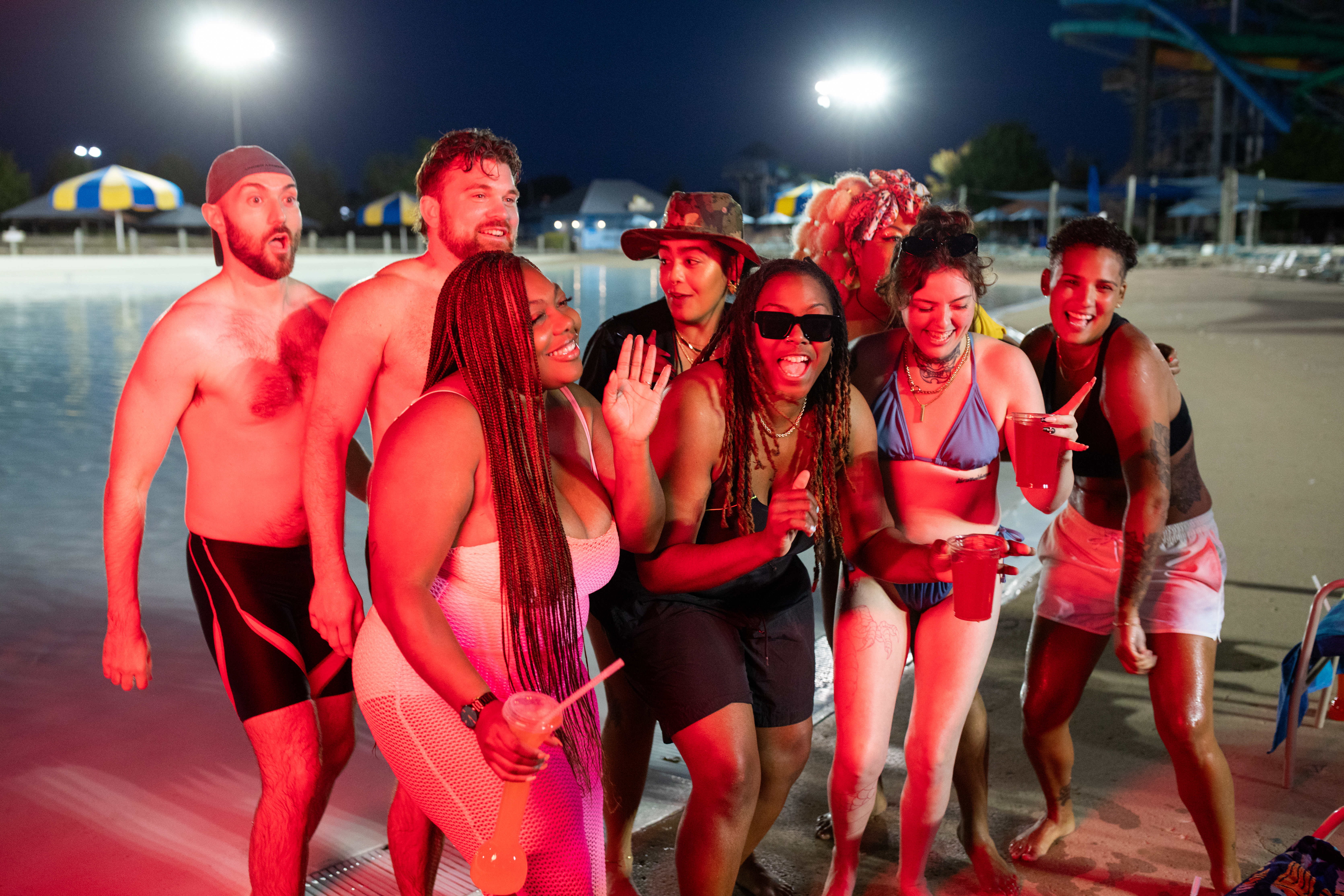friends smiling at water park