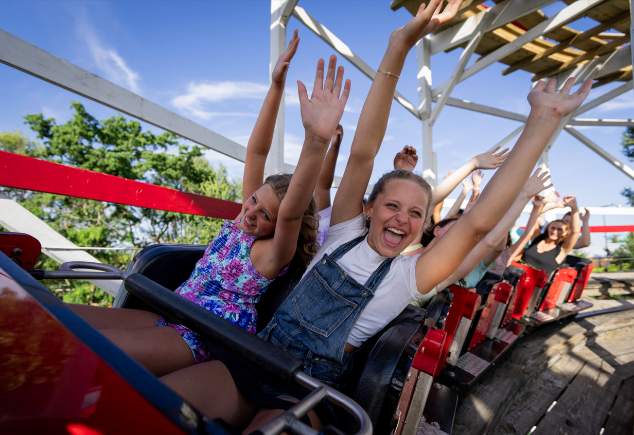 children on roller coaster