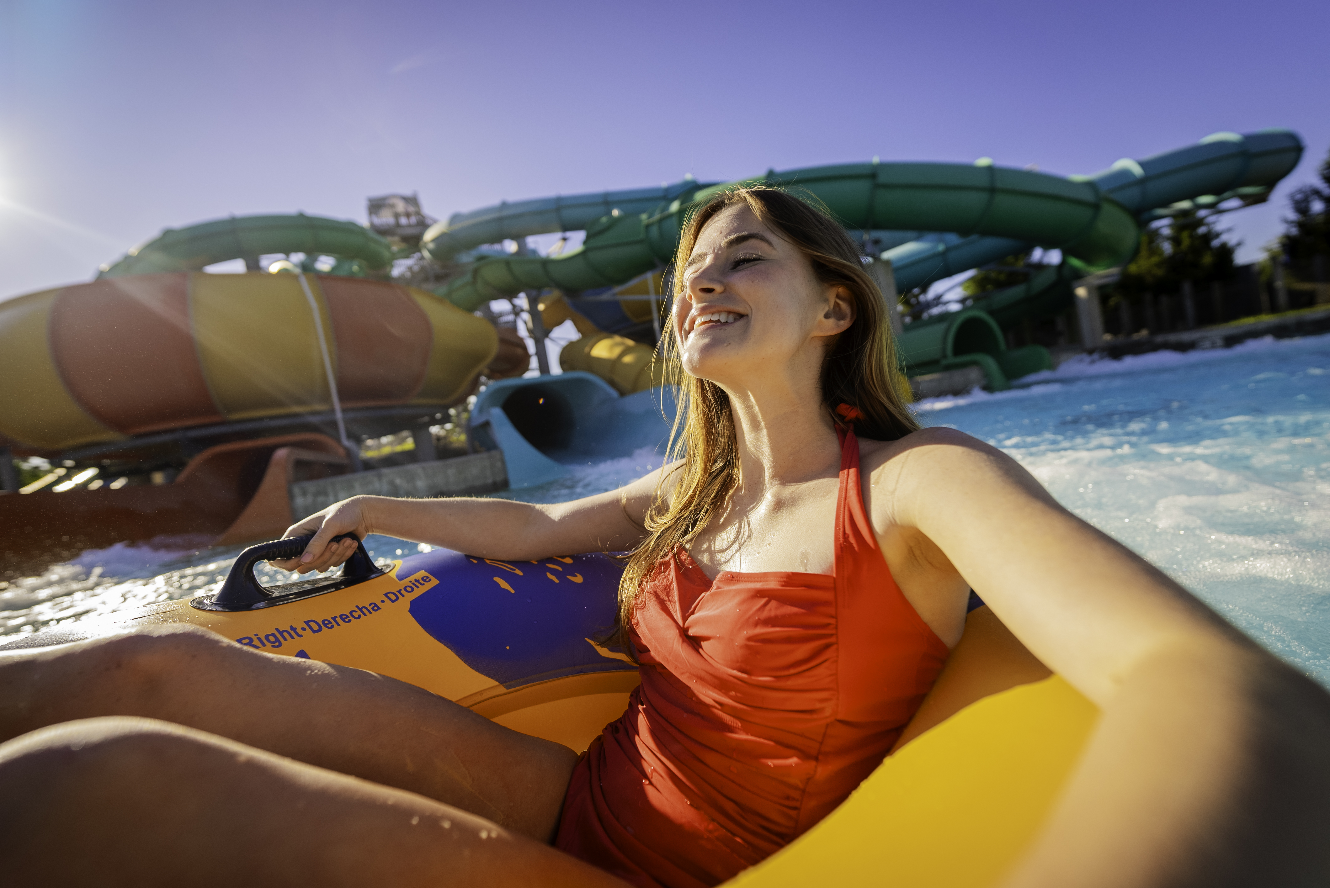 guest in inner tube at water park