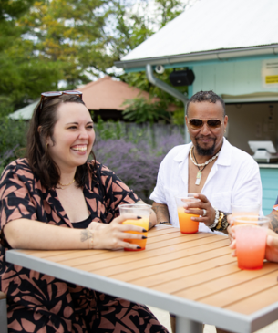 guests smiling at table
