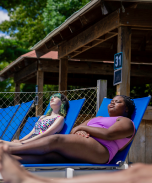 friends lounging in sun